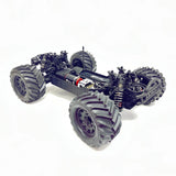 Tekno MT410 2.0 Pro 1/10 electric 4x4 monster truck kit with detailed chassis and off-road tires, ready for rugged terrain.
