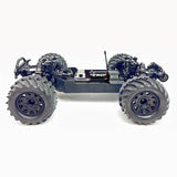 Tekno MT410 2.0 1/10 scale electric 4x4 Pro monster truck kit showing the detailed chassis and large tires.