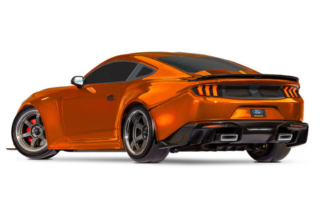 Traxxas 4-Tec Drift Ford Mustang remote control car on a track, showcasing its detailed design and sporty appearance.