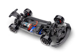 Traxxas 4-Tec Drift Ford Mustang RC car shown on a track, featuring detailed exterior and realistic drift design.