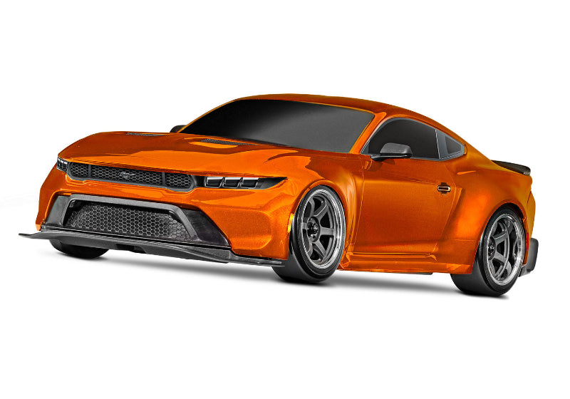 Traxxas 4-Tec Drift Ford Mustang radio-controlled car with metallic copper body and detailed design on a white background