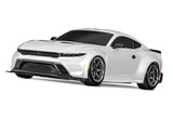 White Traxxas 4-Tec Drift Ford Mustang remote control car on a track, showcasing its detailed body and racing design.