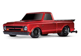 Red Traxxas Drag Slash C10 HD RC truck with detailed body and large tires, designed for high-speed drag racing.