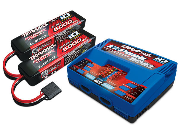 Traxxas EZ-Peak dual charger charging two 5000mAh 3S LiPo batteries for RC vehicles.