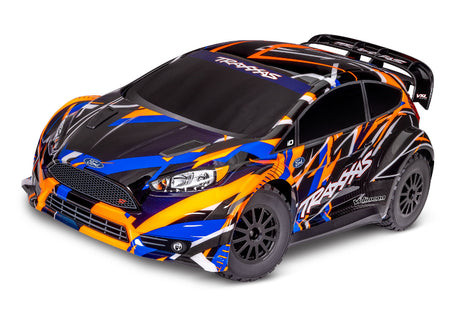Traxxas Ford Fiesta ST Rally VXL remote control car on a track with detailed exterior and rally-inspired design.