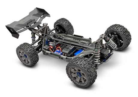 Traxxas Jato 4X4 BL-2s remote control car on a track, showcasing its off-road tires and sleek design.
