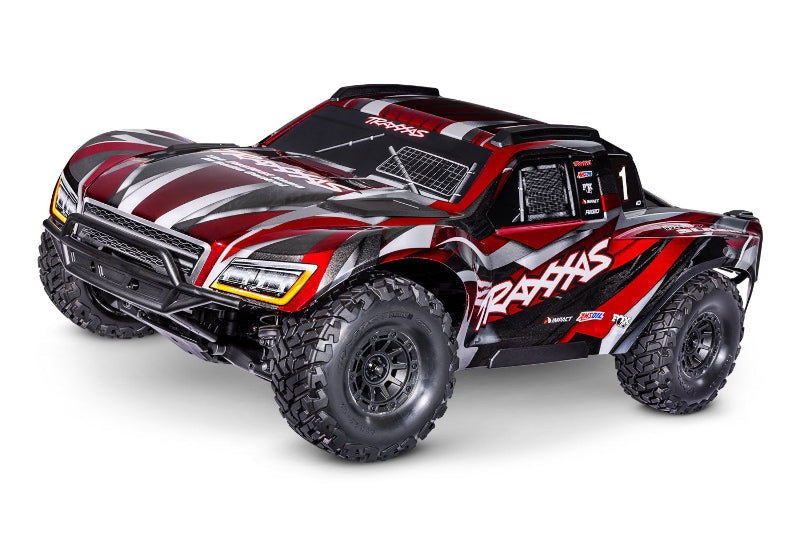 Traxxas Maxx Slash 6S RC truck with large tires and sleek black and red body, designed for high-speed off-road performance.