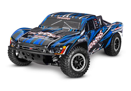 Traxxas Slash 4X4 VXL radio-controlled monster truck on rugged terrain, showcasing its off-road tires and high-performance chassis.