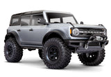 Traxxas TRX-4 2021 Ford Bronco 4x4 RTR crawler in silver, showing detailed exterior and rugged off-road design.