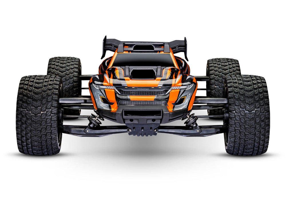 Orange Traxxas XRT 8S remote-controlled truck with rugged tires and detailed body, designed for off-road racing and durability.