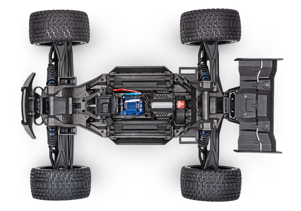 Orange Traxxas XRT 8S remote control monster truck with large tires and detailed body design.