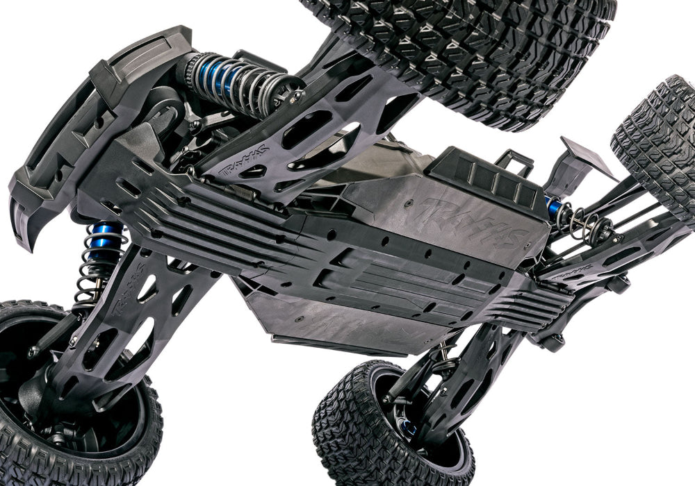 Orange Traxxas XRT 8S remote control monster truck with rugged tires and detailed body, designed for off-road performance.