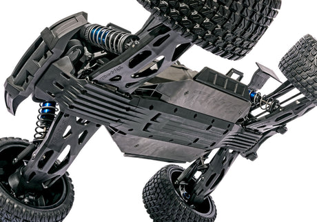 Orange Traxxas XRT 8S remote control monster truck with rugged tires and detailed body, designed for off-road performance.