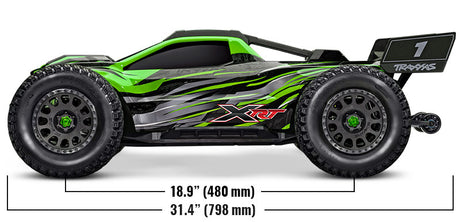 Traxxas XRT 8S monster truck in orange with large tires and rugged body, designed for off-road RC racing and durability.