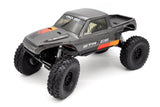 Gray Vanquish VRD Stance 4x4 RTR crawler with realistic details and rugged tires, ready for off-road adventures.