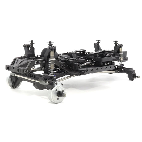 Vanquish VS4-10 Builders Kit featuring portal axles, with components displayed for custom RC truck building.