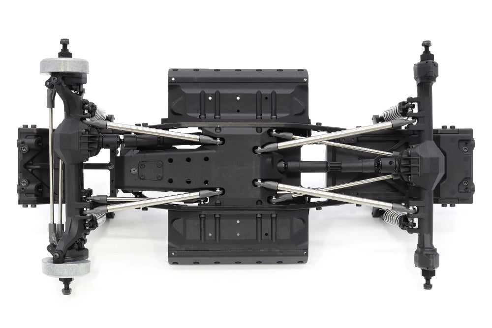 Vanquish VS4-10 Builders Kit with portal axles, showing assembled chassis and detailed components for RC crawler customization.