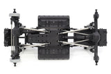 Vanquish VS4-10 Builders Kit with portal axles, showing assembled chassis and detailed components for RC crawler customization.