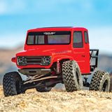 Vanquish VS4-10 Phoenix RTR remote control truck with detailed chassis and colorful body design, ready for off-road racing.