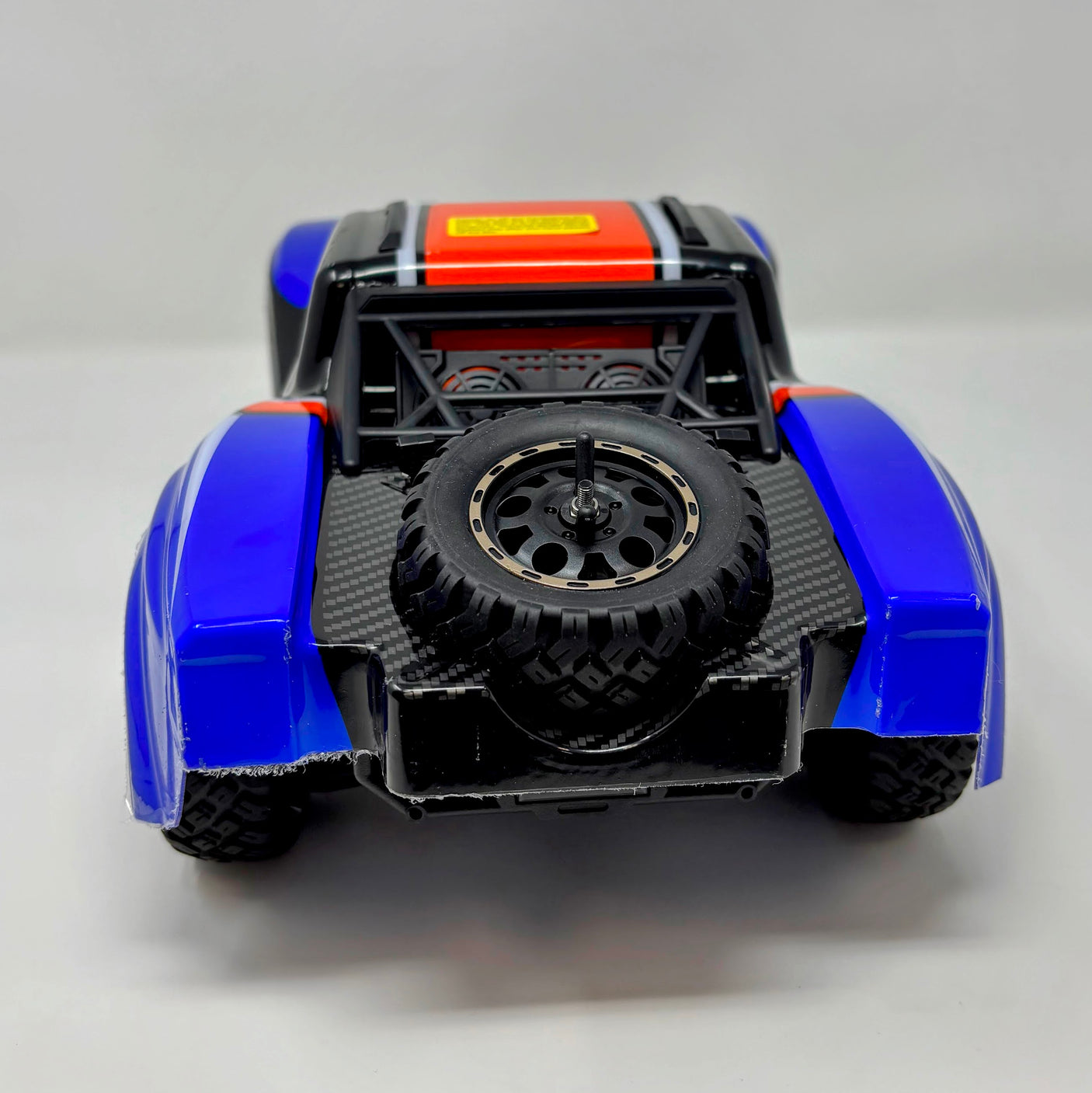 HPI Racing Blackzon Vyper SC Turbo 1/16 scale 4WD electric RC car with brushless motor and turbo design, shown in black and red.