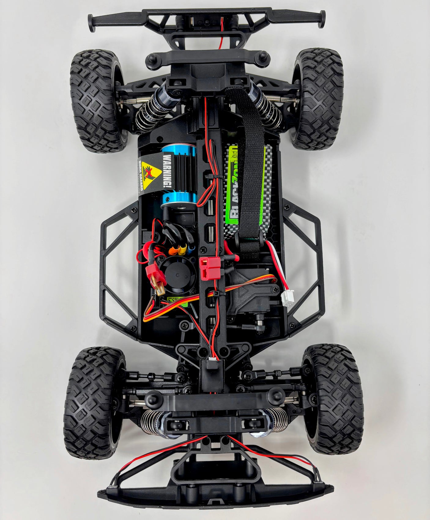 HPI Racing Blackzon Vyper SC Turbo 1/16 electric 4WD RC car with brushless motor and sleek black design.