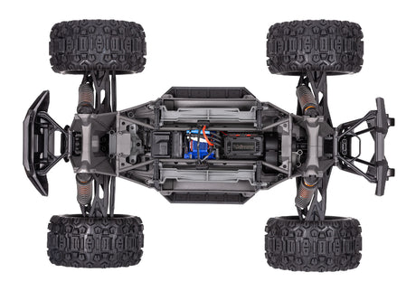 Traxxas X-Maxx 8S belt-driven RC monster truck with large tires and robust chassis, ready for off-road adventures.