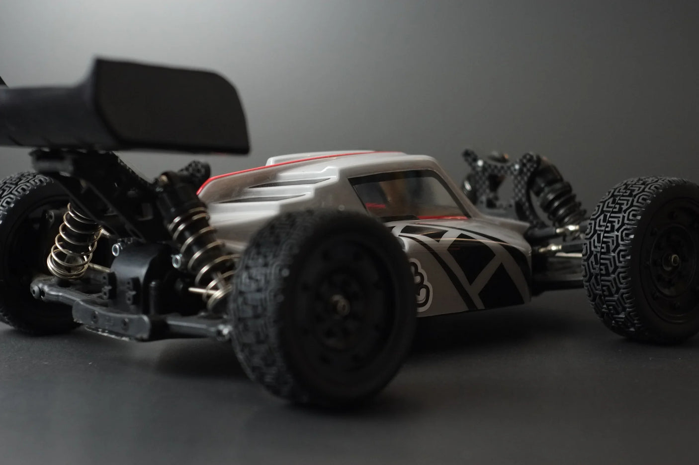 Phat Bodies ATAK Buggy RC body with 190mm wheelbase, featuring sleek design and detailed graphics for off-road racing.