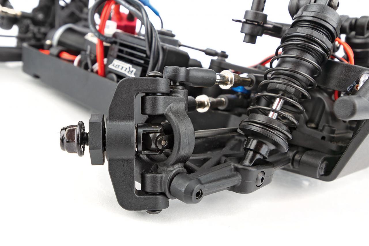 Team Associated Reflex 14MT 1/14 scale 4WD RC monster truck with rugged tires and detailed body in action.