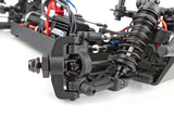 Team Associated Reflex 14MT 1/14 scale 4WD RC monster truck with rugged tires and detailed body in action.