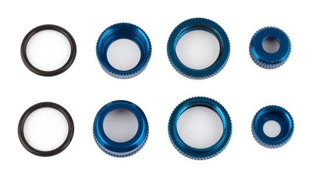Team Associated Reflex 14 aluminum shock caps and collars with blue accents for RC car suspension.