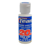 Team Associated Factory Team silicone shock oil for RC cars, 2oz bottle with black cap and clear label, designed for smooth suspension.