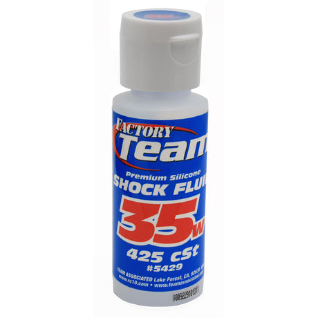 Team Associated Factory Team silicone shock oil in a 2oz bottle for RC car shocks, with a clear view of the product label.