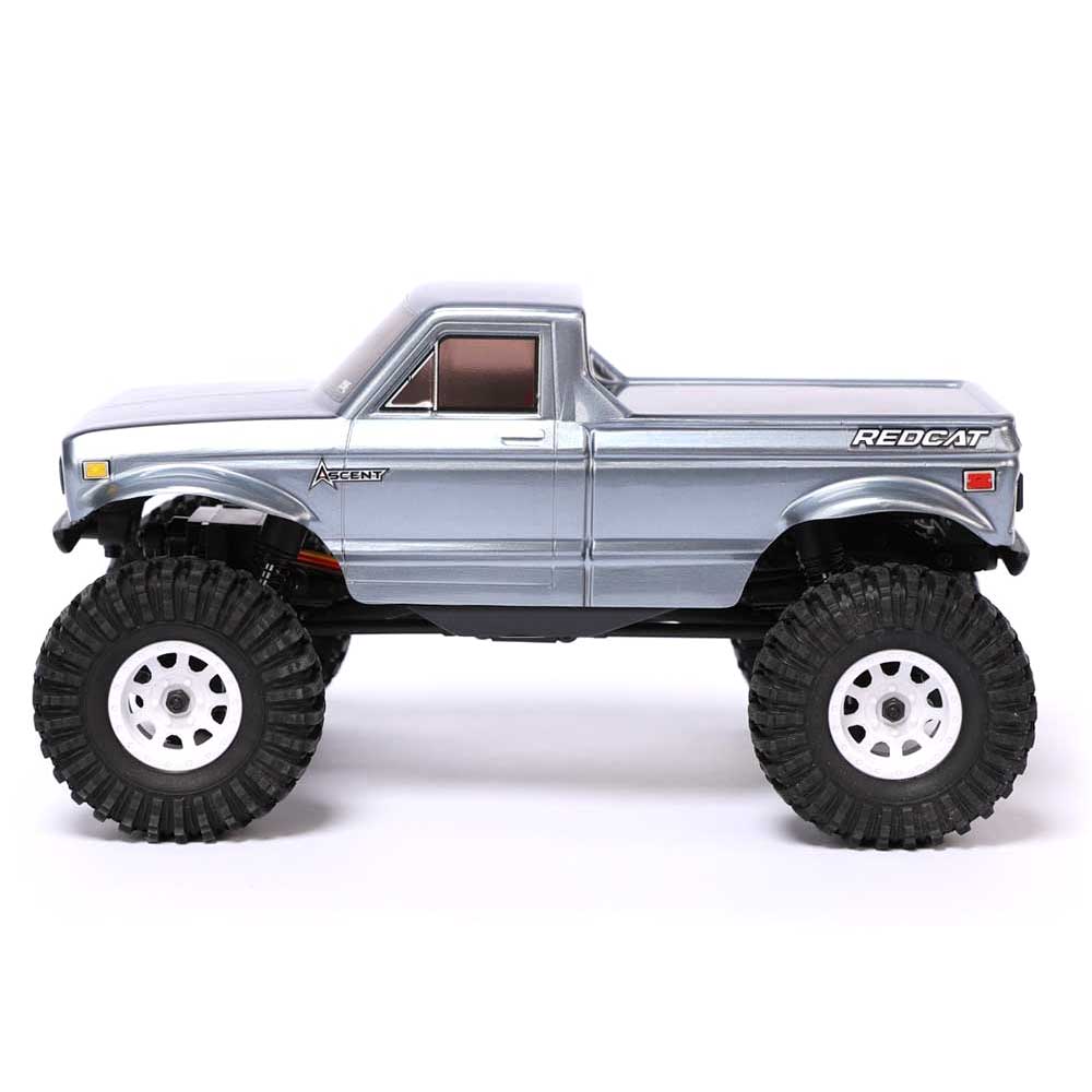 Redcat Ascent-18 RC off-road vehicle with gray body and rugged tires, designed for durability and performance on rough terrain.
