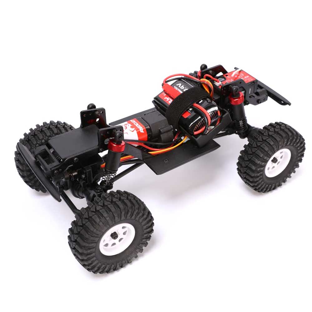 Redcat Ascent-18 RC car chassis with red and black components, showcasing the detailed body and suspension system.