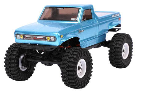 Redcat Ascent-18 RC car with blue body and detailed design, shown from a side angle on a white background.