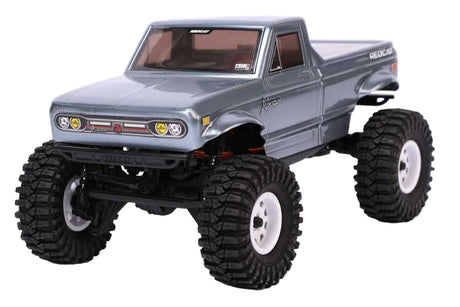 Redcat Ascent-18 radio-controlled off-road truck with gray body and detailed design, ready for rugged outdoor terrain.