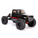 Redcat Ascent Fusion 1/10 scale brushless RTR rock crawler with red chassis and large tires on rocky terrain