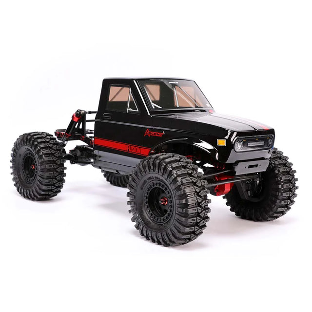 Redcat Ascent Fusion 1/10 scale brushless RTR rock crawler with red chassis and large tires on rocky terrain