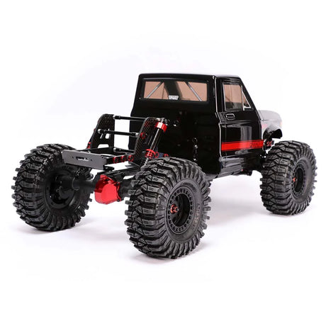 Redcat Ascent Fusion 1/10 scale brushless RC rock crawler with red chassis and rugged tires, ready for off-road adventure.