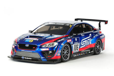 Tamiya TT-02 Subaru WRX STI 24H Nürburgring RC car kit with detailed body and racing decals on a black chassis.