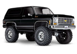 Black Traxxas TRX-4 1979 Chevrolet Blazer RC model shown from a three-quarter side view.