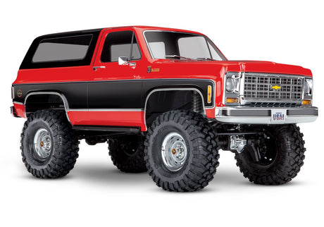 Red Traxxas TRX-4 1979 Chevrolet Blazer radio-controlled scale truck viewed from a three-quarter angle.