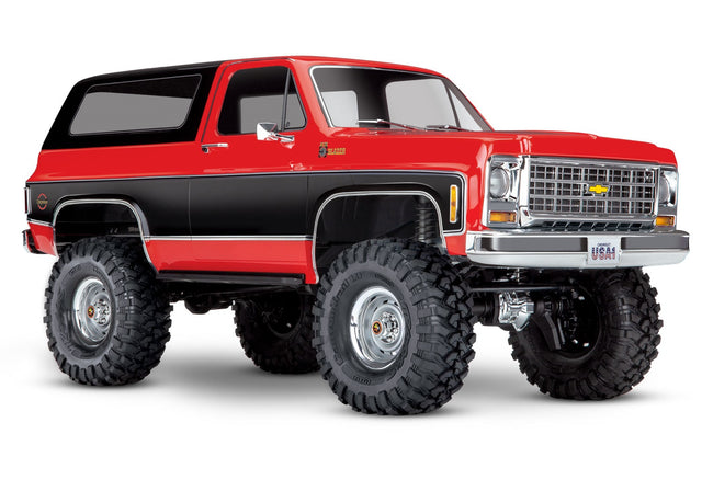 Red Traxxas TRX-4 1979 Chevrolet Blazer radio-controlled scale truck viewed from a three-quarter angle.