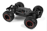 BlackZon HPI Racing Bl Spryte ST 1/20 4WD electric stadium truck with detailed black and red design, off-road tires, and sleek body.