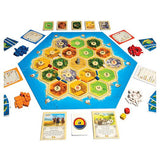 Catan board game by Catan Studio featuring colorful hex tiles, resource cards, and game pieces for strategic play