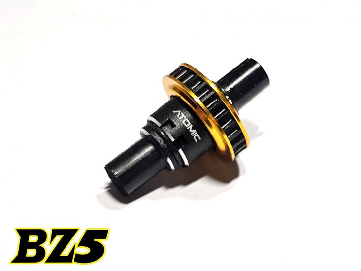Atomic RC BZ5 aluminium ball diff with dust guard for RC cars, shown with metal components and dust protection features.
