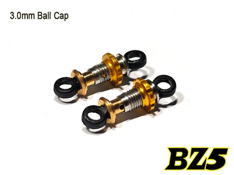 Pair of Atomic RC BZ5 Short Front Metal Dampers for RC cars, showing silver metal construction and mounting hardware.