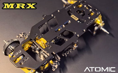 Atomic RC MRX 2WD Pan Car Kit with sleek chassis and detailed components, ready for high-speed remote control racing.