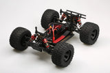 LC Racing EMB-MT 1/14 scale 4WD RTR monster truck with rugged tires and detailed body in a dynamic off-road setting
