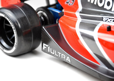Exotek Racing Ultra F1 lightweight clear RC car body with detailed design and aerodynamic shape for high-performance racing.